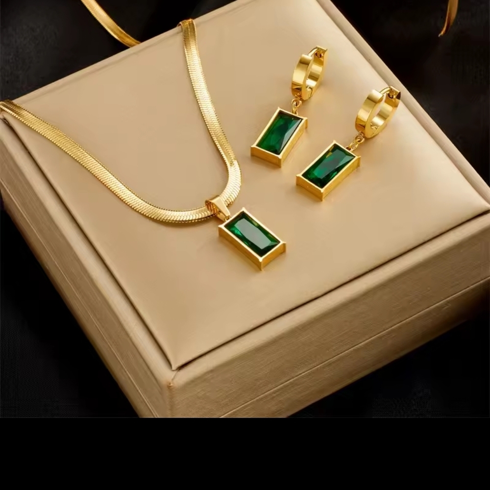 CLEARANCE..Set Lab Created EMERALD STAINLESS ST.